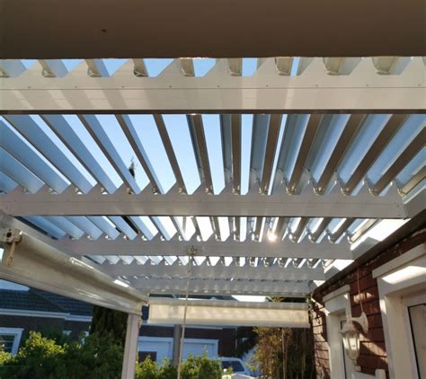 adjustable patio roof system